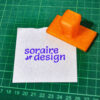 Sello de goma personalizado Soraire Design tinta