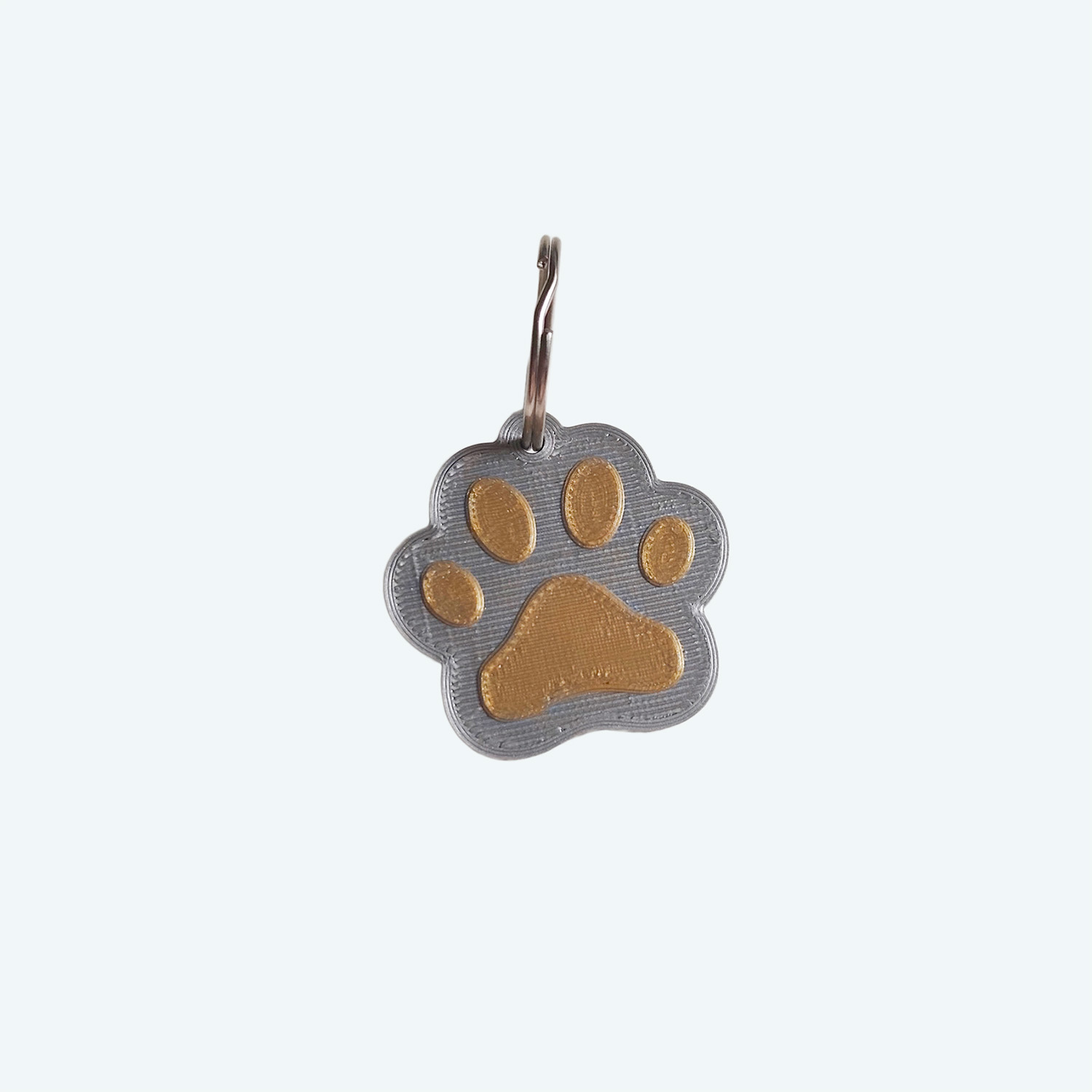 Chapita para Mascotas 3D Impresion Soraire Design Huella - 40x36mm Adelante