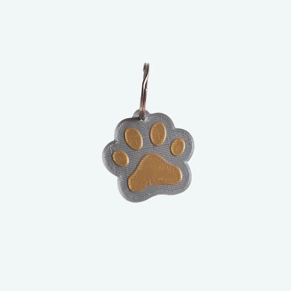 Chapita para Mascotas 3D Impresion Soraire Design Huella - 40x36mm Adelante