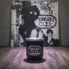Mate termico grabado laser personalizado negro Soraire Design Charly Garcia Clics Modernos Dinosaurios Detras